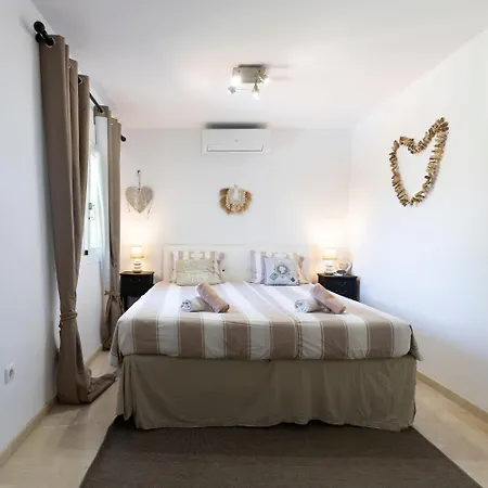 Rosario Villa *